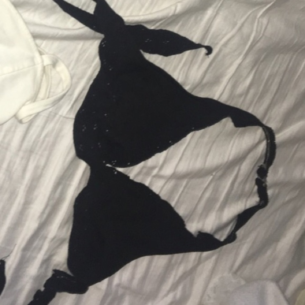 black halter baiting suit with ruffle edge